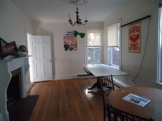 6-8 Imrie Rd, Boston, MA 02134 - dining room featuring a chandelier, wood finished floors, a high end fireplace, and baseboards