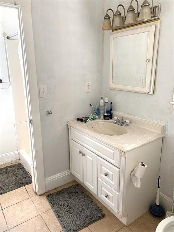 6-8 Imrie Rd, Boston, MA 02134 - bathroom featuring vanity, a shower, tile patterned floors, baseboards, and a tub