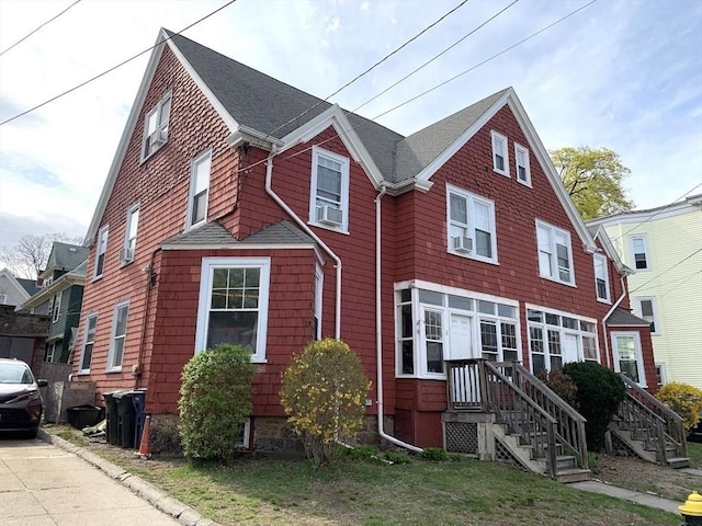 6-8 Imrie Rd, Boston, MA 02134 - view of front of property featuring a shingled roof and cooling unit