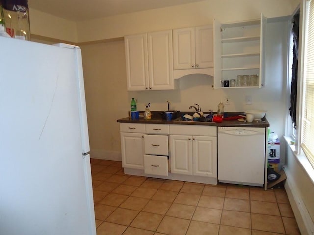 6-8 Imrie Rd, Boston, MA 02134 - kitchen featuring white appliances, a sink, dark countertops, white cabinets, and light tile patterned flooring