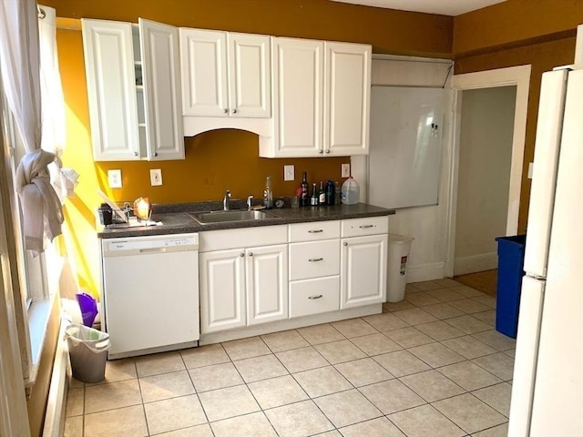 6-8 Imrie Rd, Boston, MA 02134 - kitchen with white appliances, a sink, white cabinetry, and dark countertops