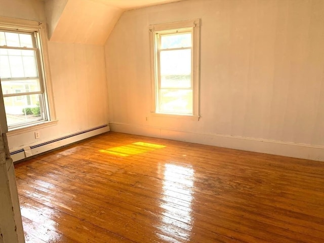 6-8 Imrie Rd, Boston, MA 02134 - bonus room with a baseboard radiator, hardwood / wood-style flooring, plenty of natural light, vaulted ceiling, and baseboards