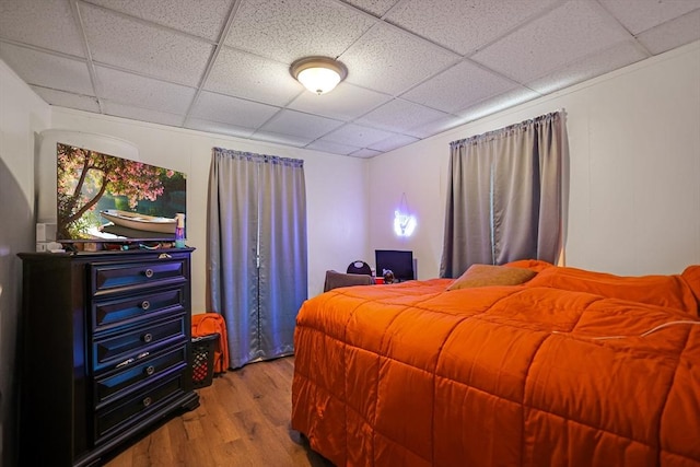 19-21 Pleasant Ter, Lawrence, MA 01841 - bedroom with a drop ceiling and wood finished floors