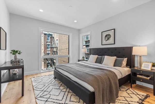 43 Stillman St Unit 201, Boston, MA 02113 - bedroom with recessed lighting, light wood-style flooring, and baseboards