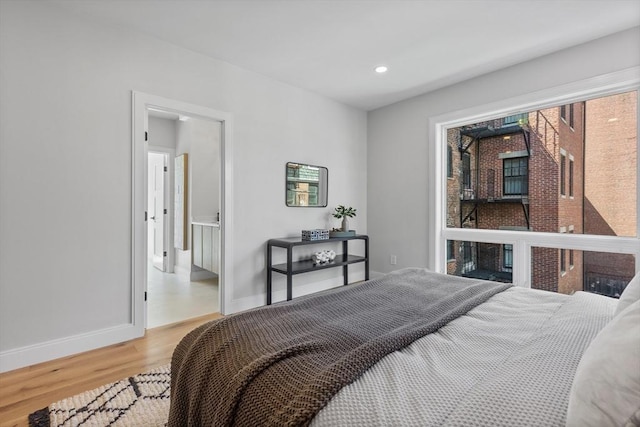 43 Stillman St Unit 201, Boston, MA 02113 - bedroom with light wood-style floors, baseboards, and recessed lighting