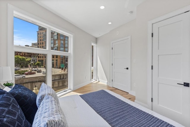 43 Stillman St Unit 201, Boston, MA 02113 - bedroom with baseboards, recessed lighting, and wood finished floors
