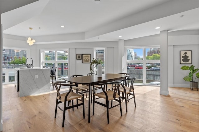 43 Stillman St Unit 201, Boston, MA 02113 - dining area with baseboards, recessed lighting, light wood-style flooring, and a wealth of natural light