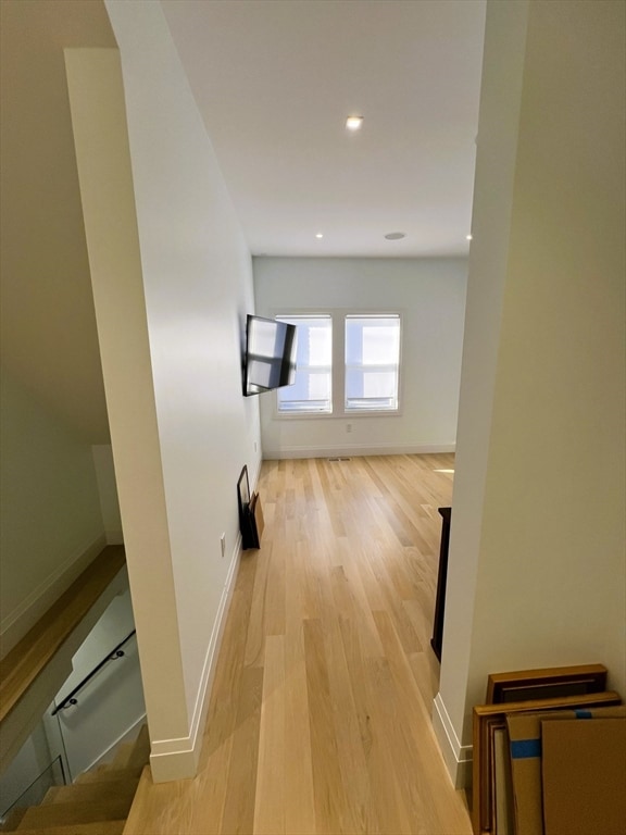 corridor featuring light wood-type flooring