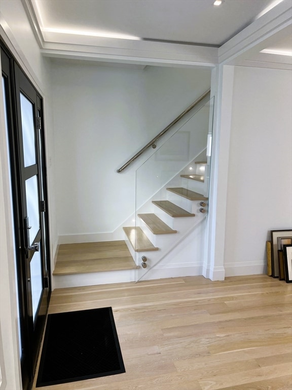 foyer featuring wood-type flooring