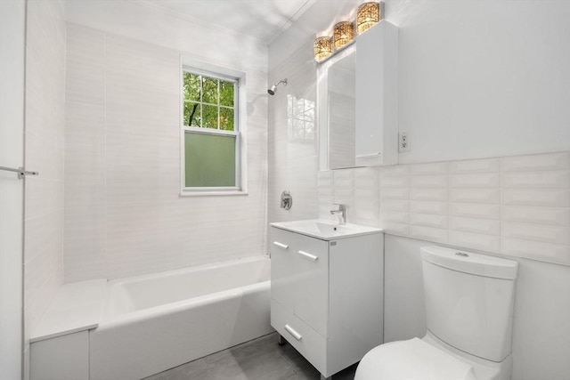 full bathroom featuring tile walls, shower / tub combination, toilet, vanity, and backsplash