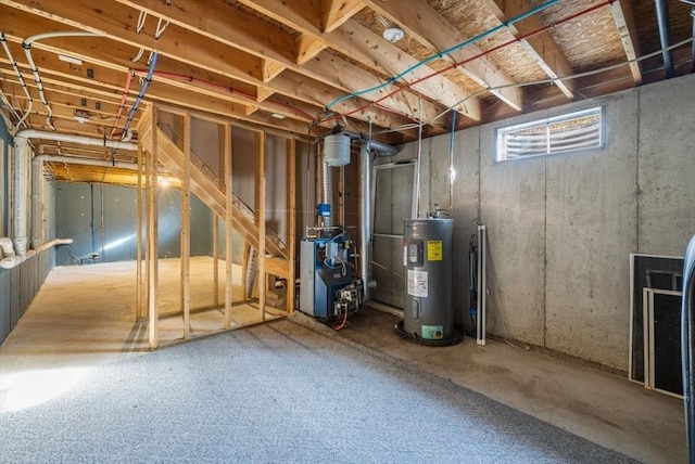 38 Brook St Unit 1, Central Falls, RI 02863 - basement featuring electric water heater, a heating unit, and oil tank