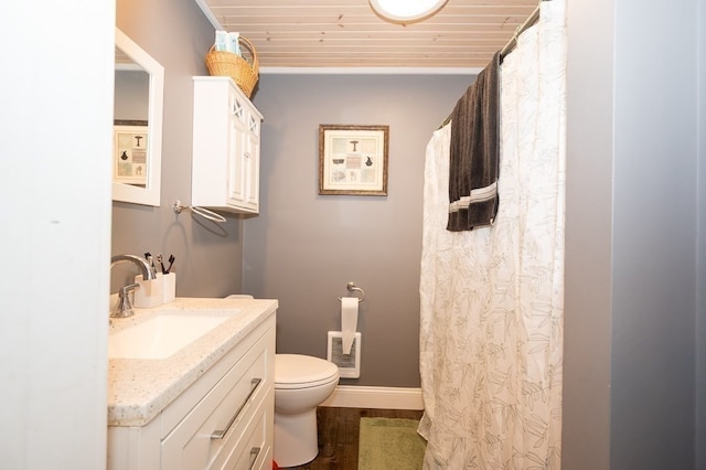 bathroom featuring toilet, wood ceiling, vanity, and wood-type flooring