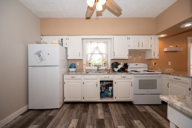 kitchen featuring white appliances, dark hardwood / wood-style flooring, and white cabinetry