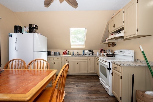 kitchen with ceiling fan, sink, white appliances, cream cabinetry, and dark wood-type flooring