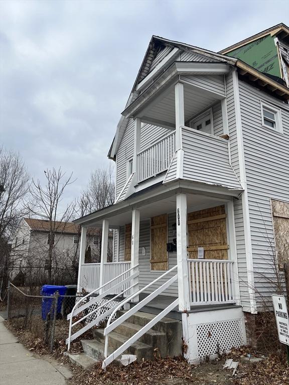 view of property exterior featuring a porch