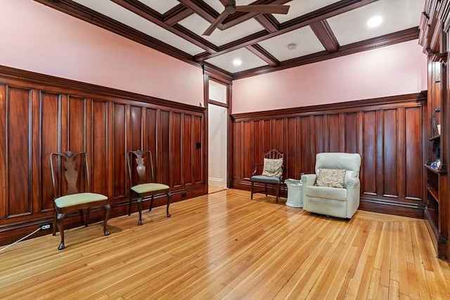114 Fenway Unit 2, Boston, MA 02115 - living area featuring ceiling fan, light wood finished floors, wainscoting, coffered ceiling, and crown molding
