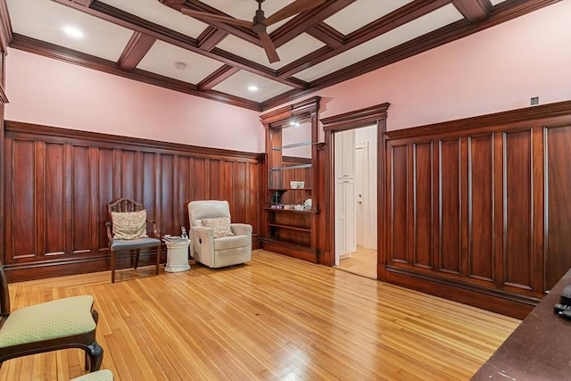 114 Fenway Unit 2, Boston, MA 02115 - living area featuring coffered ceiling, light wood finished floors, a ceiling fan, beam ceiling, and ornamental molding