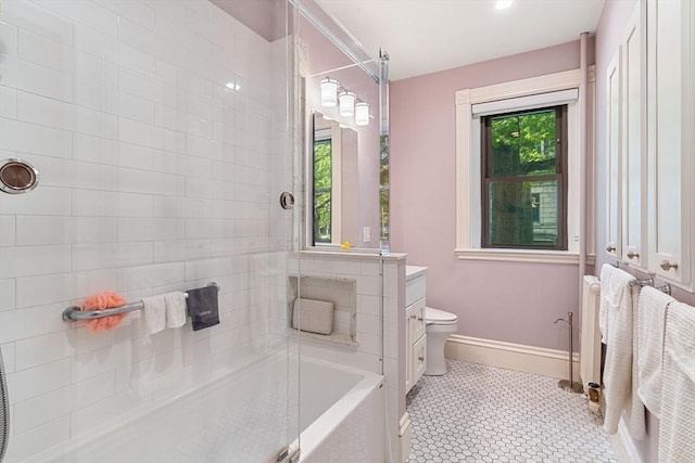 114 Fenway Unit 2, Boston, MA 02115 - bathroom with toilet, baseboards, a tub to relax in, a shower, and tile patterned flooring