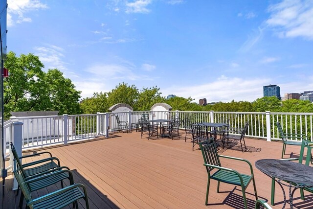 114 Fenway Unit 2, Boston, MA 02115 - wooden terrace featuring outdoor dining area