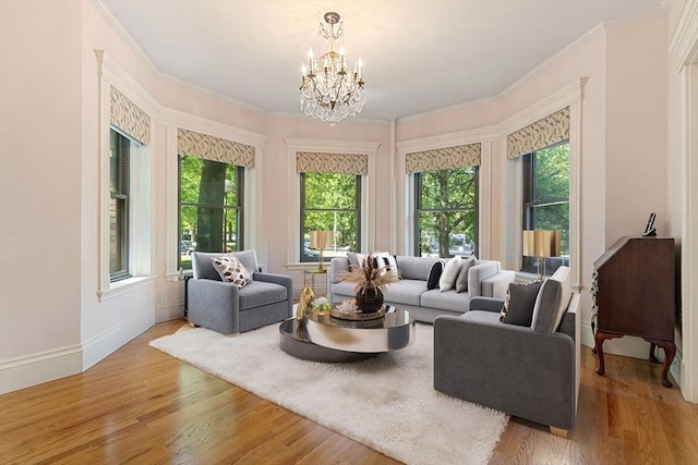 114 Fenway Unit 2, Boston, MA 02115 - living area with healthy amount of natural light, wood finished floors, a chandelier, and ornamental molding