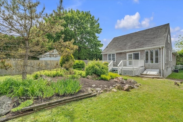 57 Center St, Dartmouth, MA 02748 - back of house with a wooden deck and a shingled roof