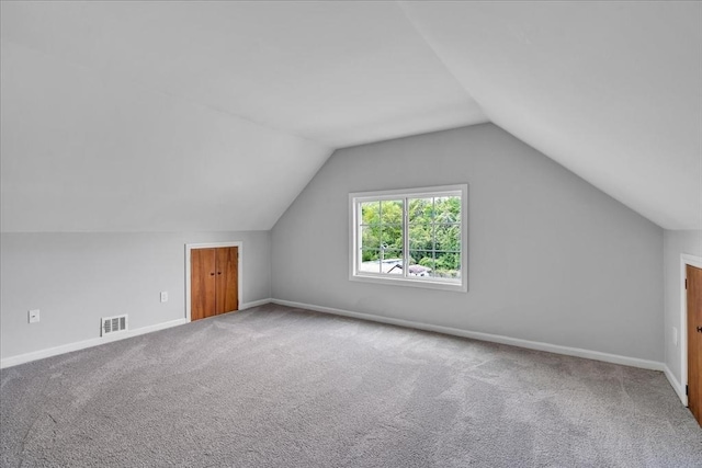 57 Center St, Dartmouth, MA 02748 - bonus room featuring carpet floors, vaulted ceiling, and baseboards