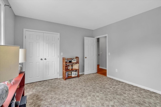 57 Center St, Dartmouth, MA 02748 - carpeted bedroom with a closet and baseboards