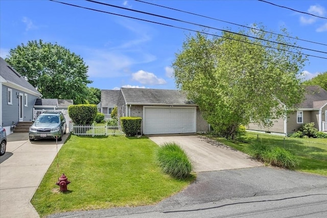 57 Center St, Dartmouth, MA 02748 - view of front facade with driveway, brick siding, and an attached garage