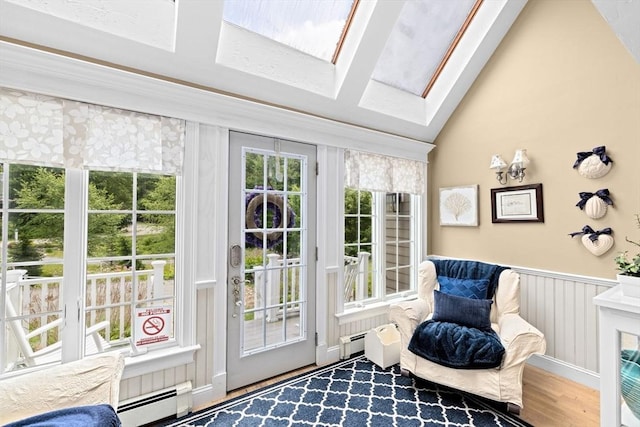 39 High Beacon Way, Marshfield, MA 02050 - doorway with a baseboard radiator, a skylight, wood finished floors, wainscoting, and vaulted ceiling