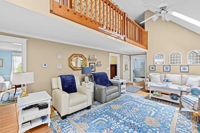 39 High Beacon Way, Marshfield, MA 02050 - living area featuring ceiling fan, wood finished floors, crown molding, and a high ceiling