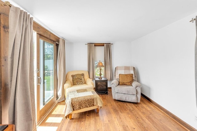 252 Railroad Ave, Norwood, MA 02062 - living area with light wood-type flooring and baseboards