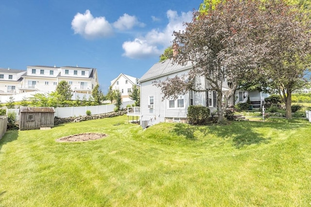 252 Railroad Ave, Norwood, MA 02062 - view of yard featuring a storage unit