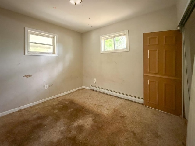 23 Eldert St, Springfield, MA 01109 - unfurnished room featuring a baseboard radiator and carpet floors