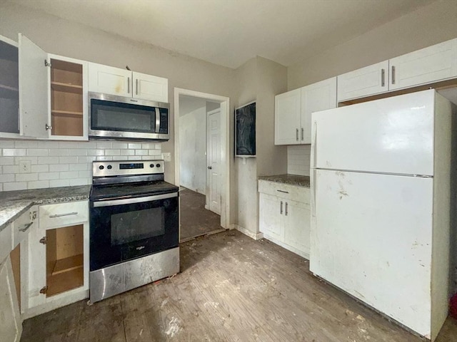 23 Eldert St, Springfield, MA 01109 - kitchen featuring stainless steel appliances, white cabinets, and backsplash