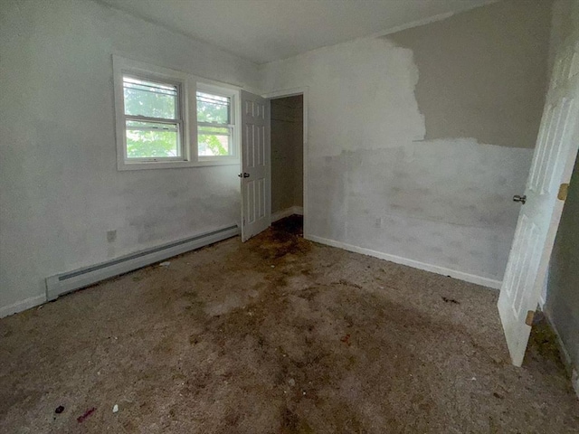 23 Eldert St, Springfield, MA 01109 - unfurnished bedroom featuring a baseboard heating unit and carpet