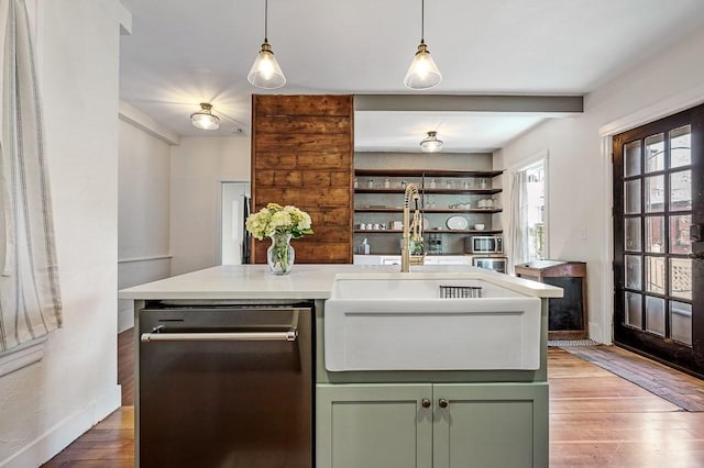 2 Oxford Pl, Worcester, MA 01609 - kitchen featuring stainless steel dishwasher, green cabinetry, a sink, baseboards, and light wood-style floors