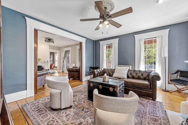 2 Oxford Pl, Worcester, MA 01609 - living room featuring wood-type flooring, a ceiling fan, and baseboards