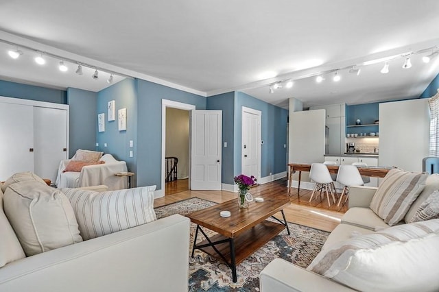 2 Oxford Pl, Worcester, MA 01609 - living room with track lighting, light wood-style flooring, and baseboards