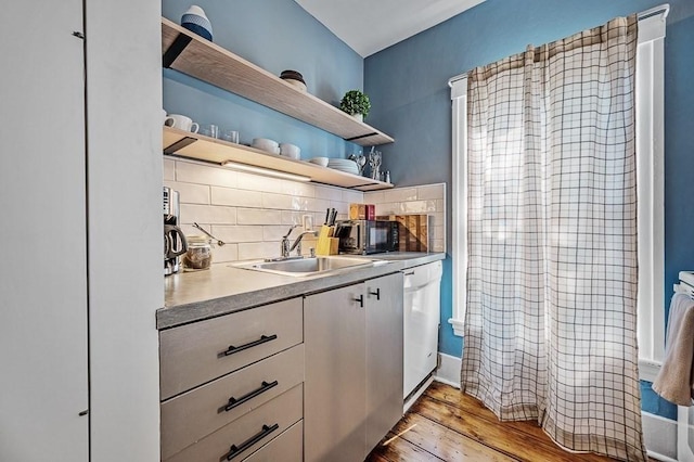 2 Oxford Pl, Worcester, MA 01609 - kitchen featuring a sink, dishwasher, open shelves, decorative backsplash, and light wood finished floors