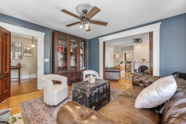 2 Oxford Pl, Worcester, MA 01609 - living room with ceiling fan, light wood-style flooring, and baseboards