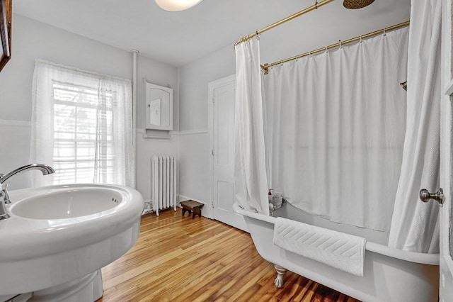 2 Oxford Pl, Worcester, MA 01609 - full bathroom with radiator heating unit, wood finished floors, and a sink