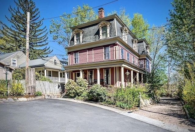 2 Oxford Pl, Worcester, MA 01609 - victorian home featuring a porch, mansard roof, and a chimney