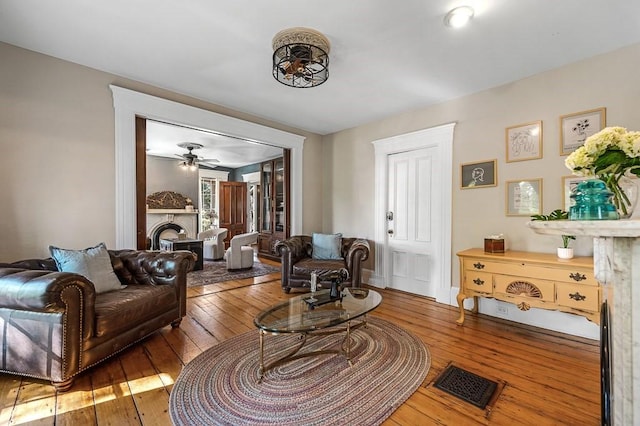 2 Oxford Pl, Worcester, MA 01609 - living area featuring a fireplace, hardwood / wood-style floors, and ceiling fan