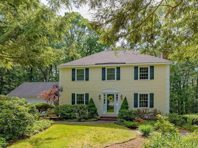 21 Overlook Dr, Chelmsford, MA 01824 - colonial inspired home featuring a chimney and a front yard