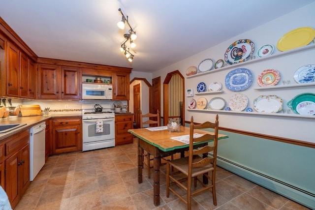 21 Overlook Dr, Chelmsford, MA 01824 - kitchen with white appliances, baseboard heating, brown cabinetry, and arched walkways