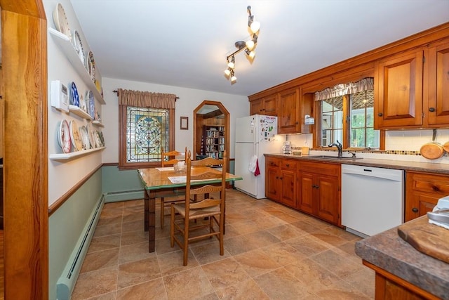 21 Overlook Dr, Chelmsford, MA 01824 - kitchen with white appliances, a baseboard heating unit, brown cabinetry, and decorative backsplash