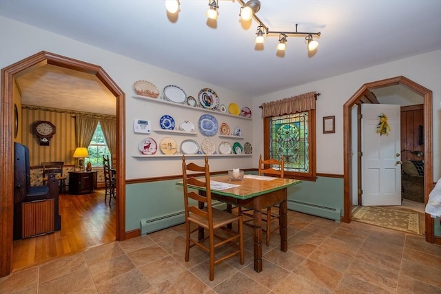 21 Overlook Dr, Chelmsford, MA 01824 - dining area with baseboard heating and arched walkways