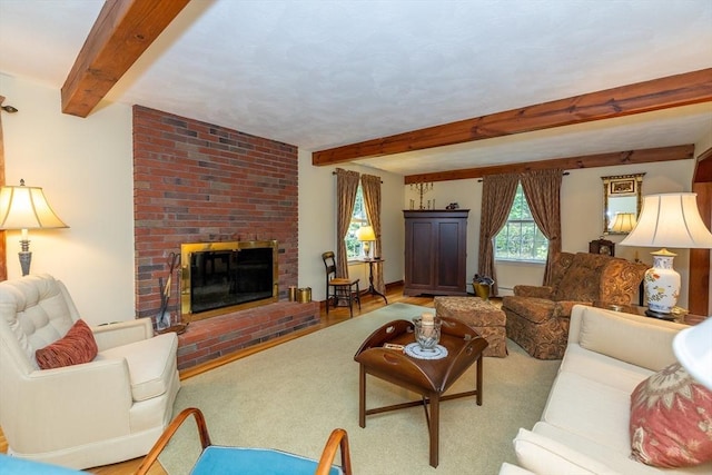21 Overlook Dr, Chelmsford, MA 01824 - living room featuring beam ceiling, a brick fireplace, and carpet floors