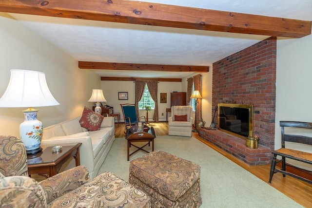 21 Overlook Dr, Chelmsford, MA 01824 - living area featuring beam ceiling, a brick fireplace, and wood finished floors