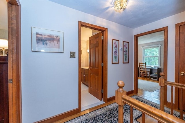 21 Overlook Dr, Chelmsford, MA 01824 - hallway featuring light wood finished floors and baseboards